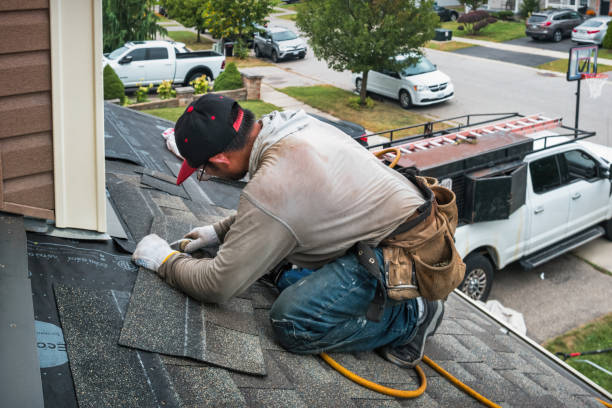 Professional Gutter Repair And Installation technician working in Canastota, NY